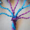 trunk is wrapped with purple wire